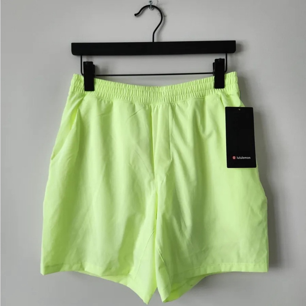 Men’s neon green Lululemon shorts. Great fabric/ Stretchy. Worn once